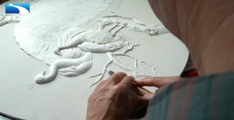 砂石畫(huà) 讓他傾心四十多年